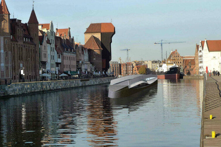 Gdy kładka jest ustawiona wzdłuż nurtu Motławy, jej konstrukcja przypomina kształtem łódż podwodną.