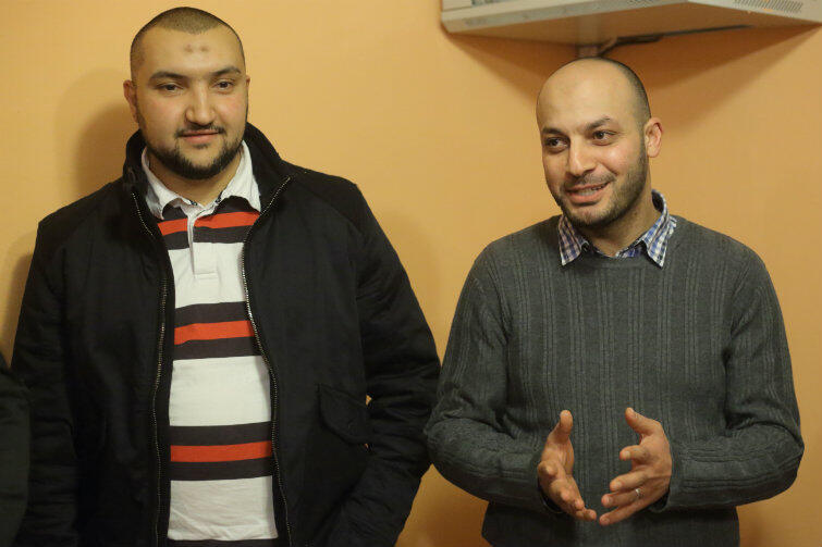Przyjeżdżają tu po pracę i pokój. Agent nieruchomości Aws Kinani z Tunezji (po lewej) i stomatolog Mohamed Atoun z Palestyny.
